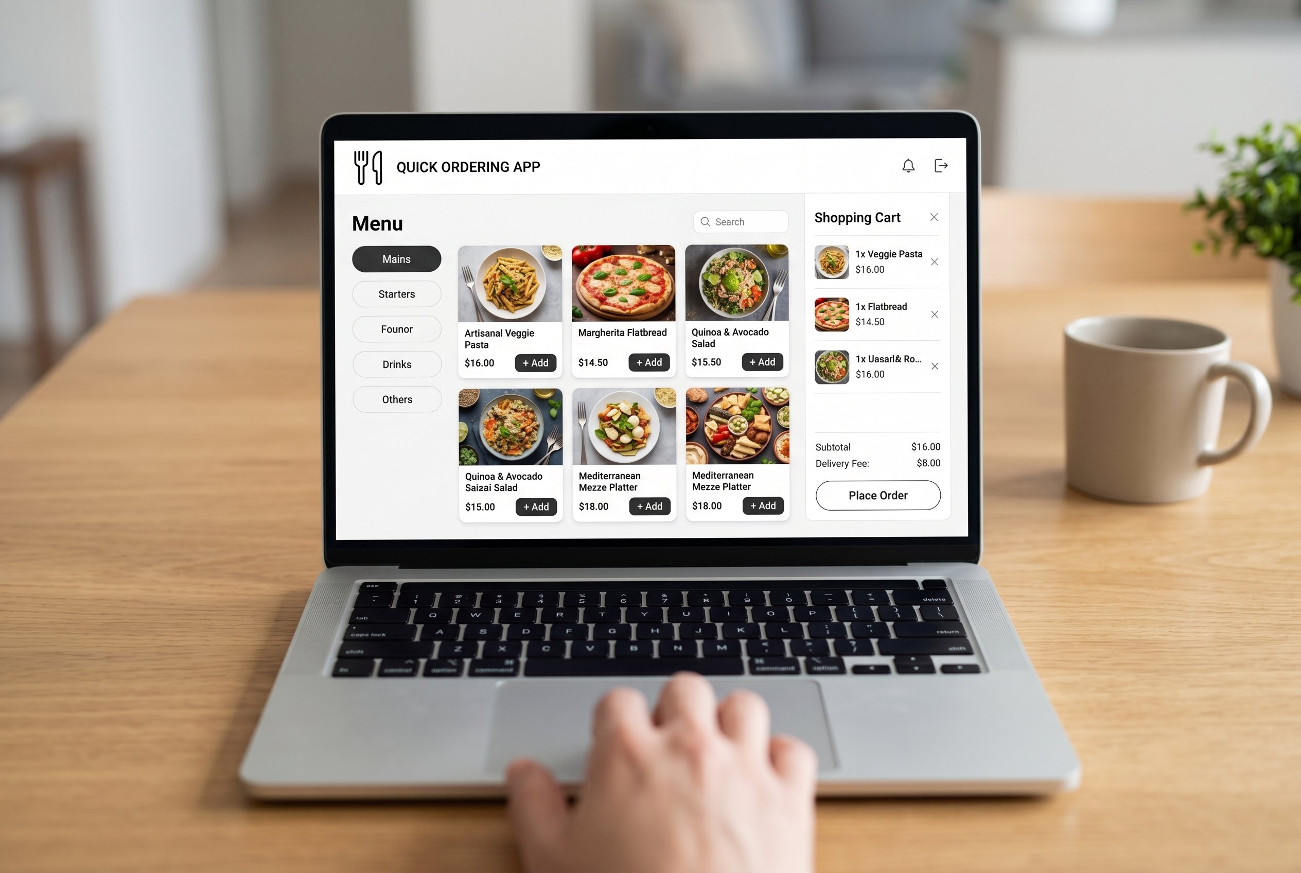 Laptop and phone displaying an online ordering interface